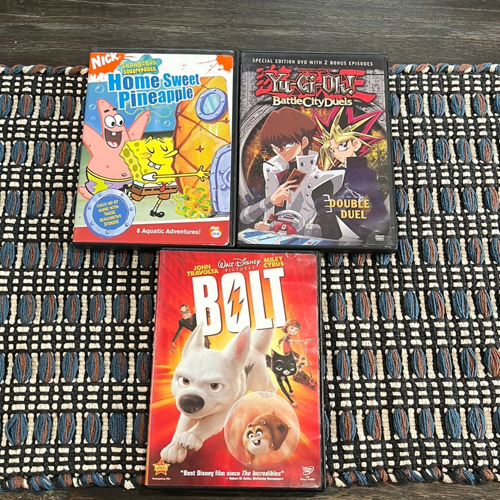 🌟SALE!  3 for $14!!🌟 Set of 3 DVDs Bolt, SpongeBob, and Yu-Gi-Oh.